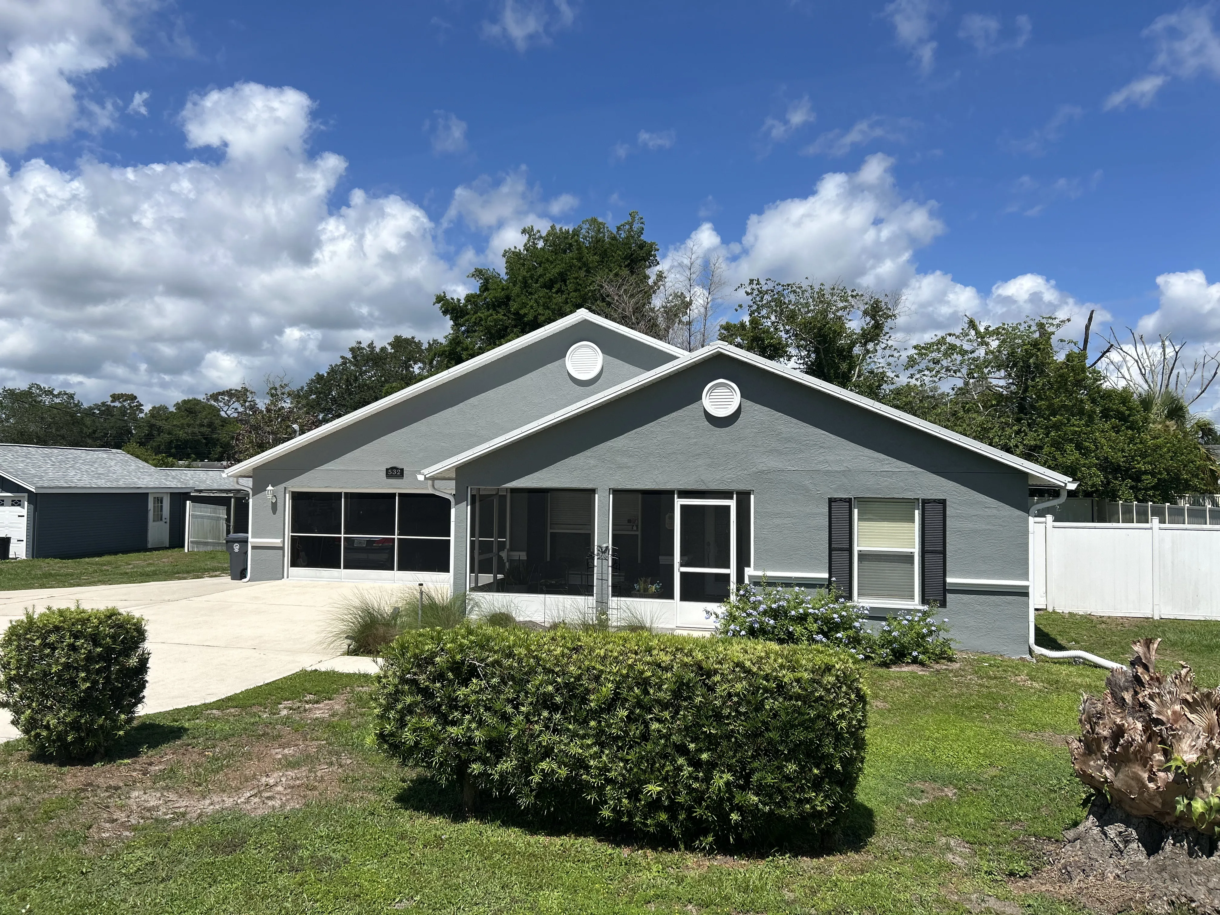 Freshly repainted home exterior in Titusville, FL by Paint Craft of Brevard